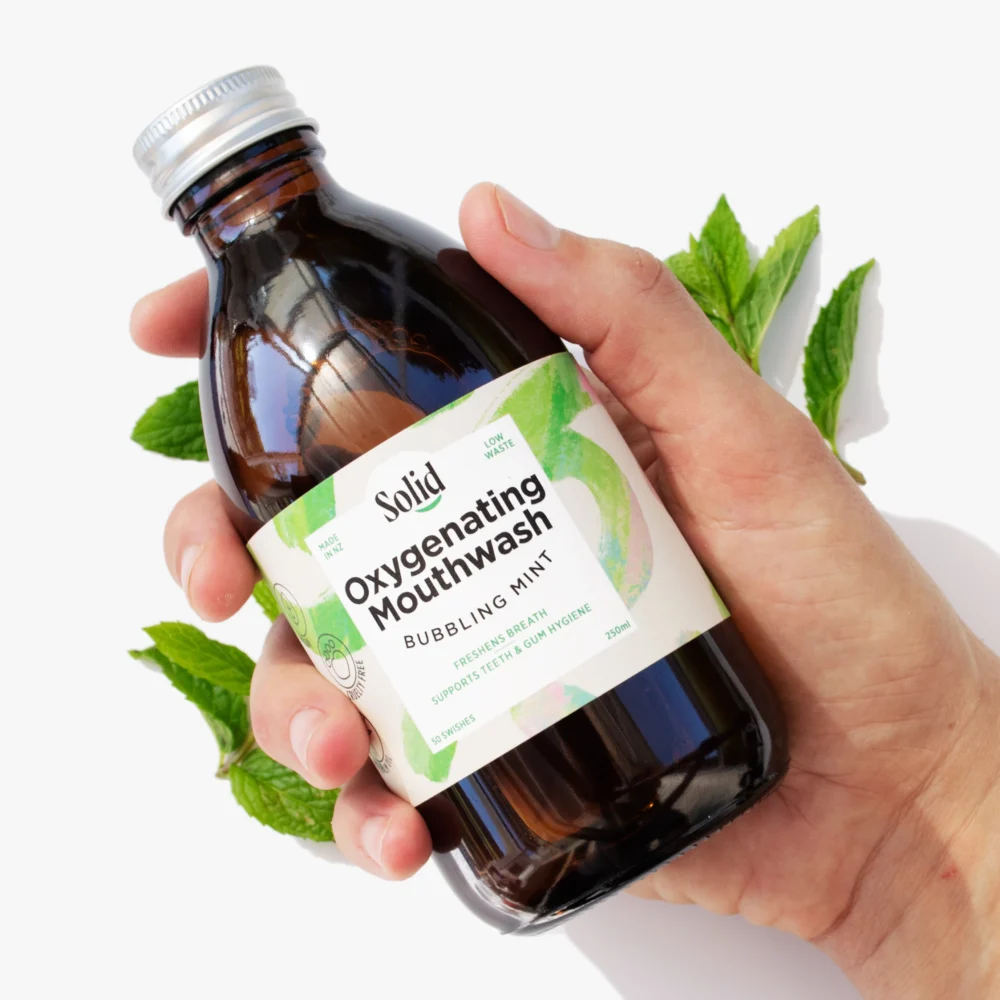 should i use mouthwash - solid mouthwash in a hand