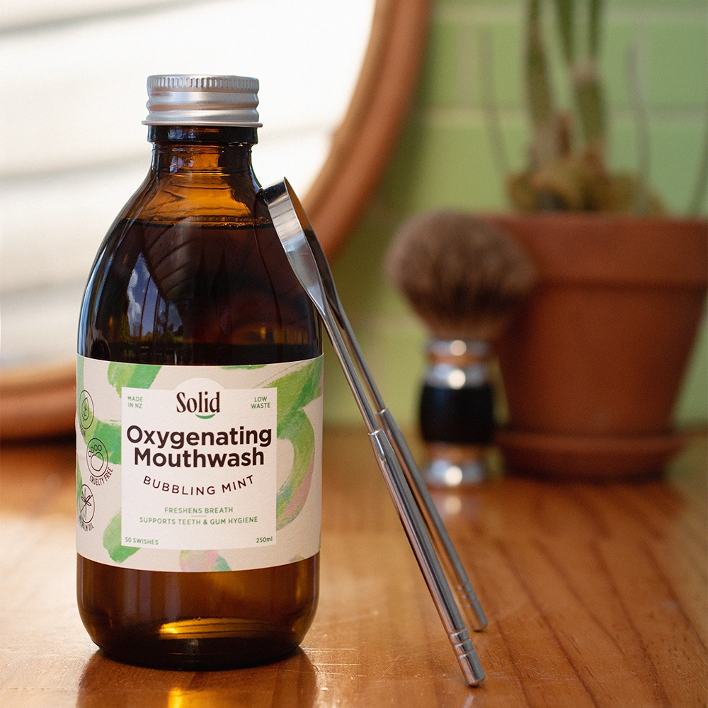 solid mouthwash and tongue scraper